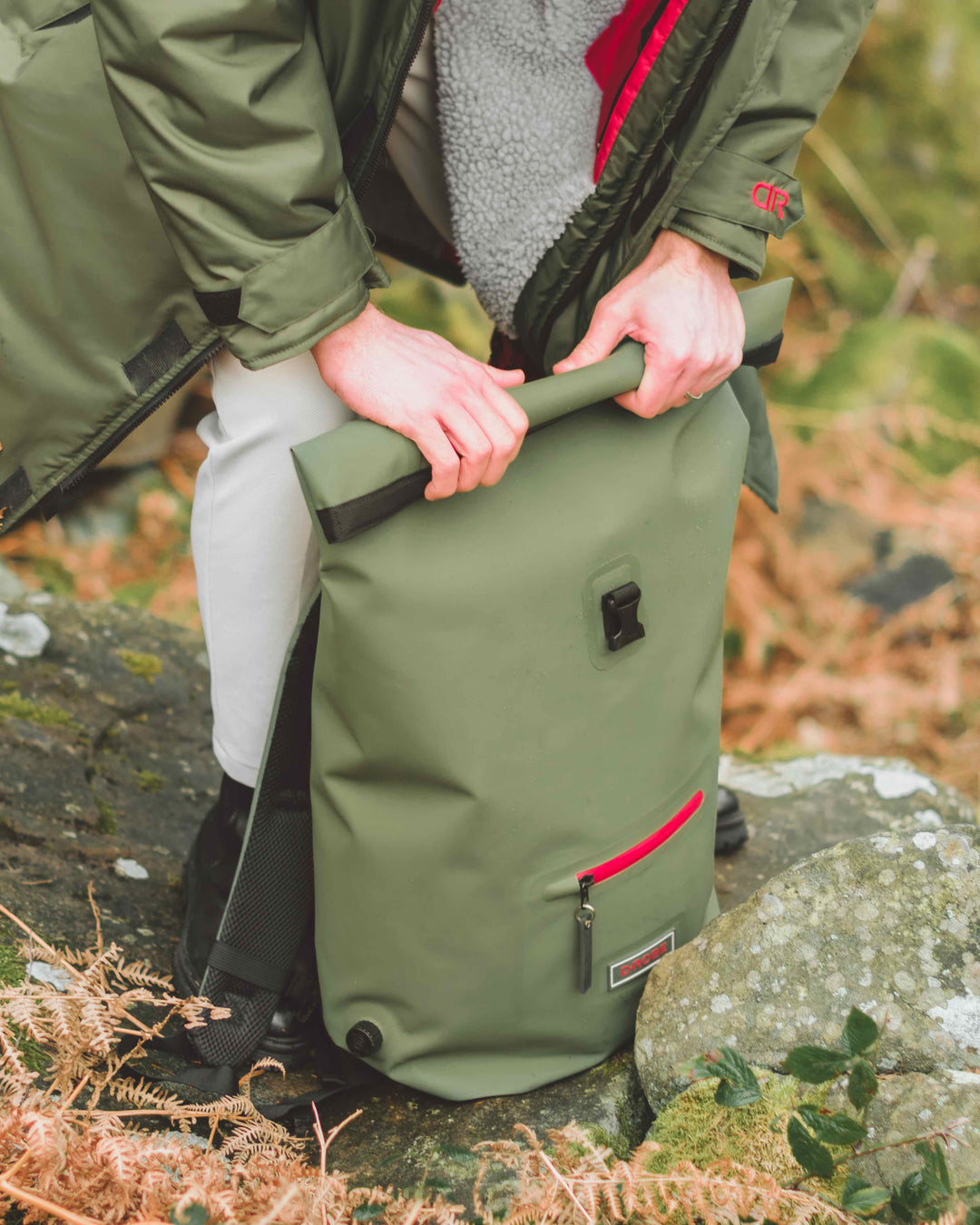  Image of D-Robe  moss green Roll-Top Rucksack. Use rolled for extra water protection when tightly closed or use unrolled when extra space is required.