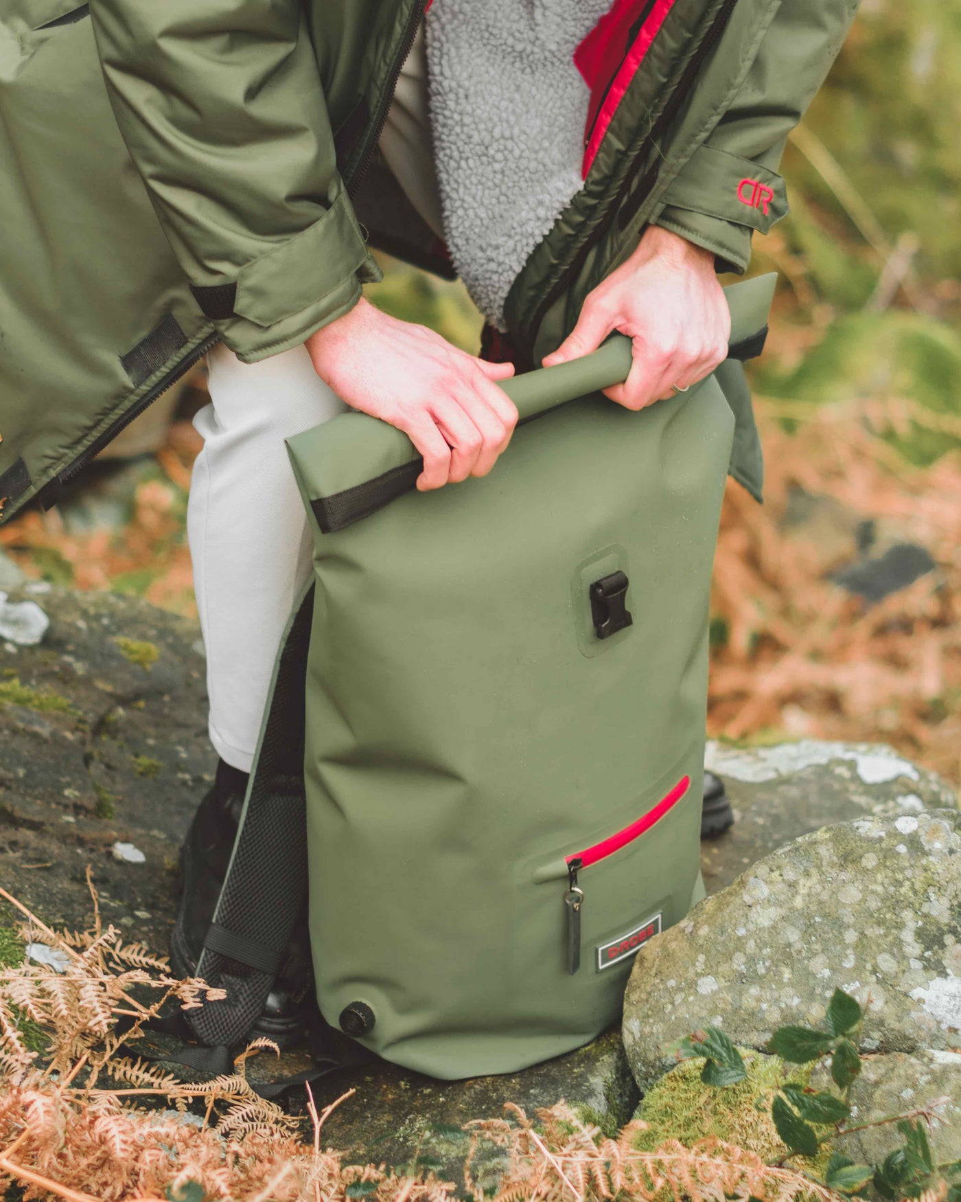  Image of D-Robe  moss green Roll-Top Rucksack. Use rolled for extra water protection when tightly closed or use unrolled when extra space is required.