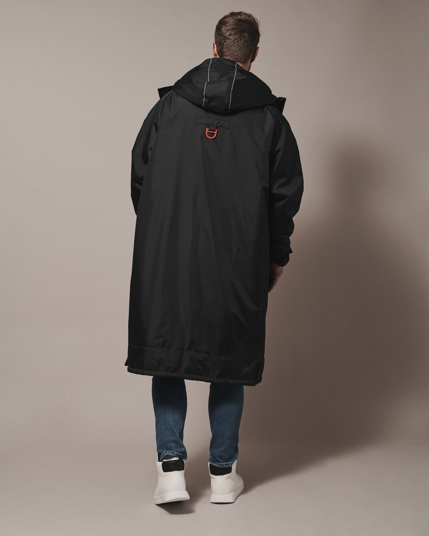 All of our robes are intentionally oversized—bigger than usual size—so that you can wrap up warm and have room for any extra layers to adapt to the ever changing weather. You can find the right fit for your robe in our size guide.