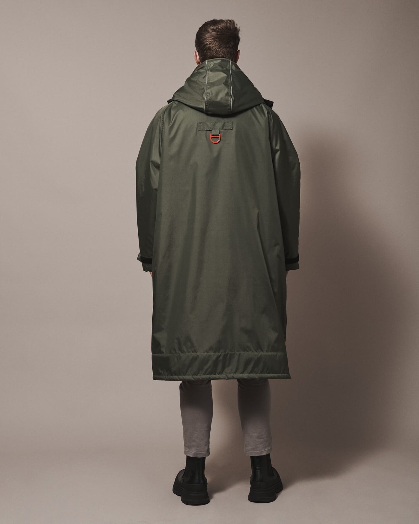 All of our robes are intentionally oversized—bigger than usual size—so that you can wrap up warm and have room for any extra layers to adapt to the ever changing weather. You can find the right fit for your robe in our size guide.