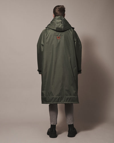 All of our robes are intentionally oversized—bigger than usual size—so that you can wrap up warm and have room for any extra layers to adapt to the ever changing weather. You can find the right fit for your robe in our size guide.