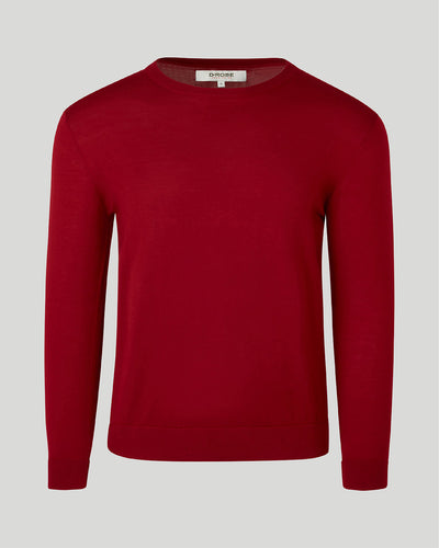 Image of our merino wool crew neck jumper in maroon red for men and women are made from a lightweight fabric and reactive natural fibre.